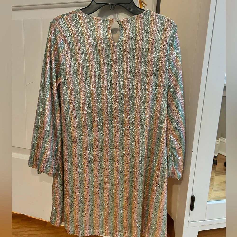 This kids dress is so beautiful! The sequins give it such a glamorous look. - Picture 5 of 10